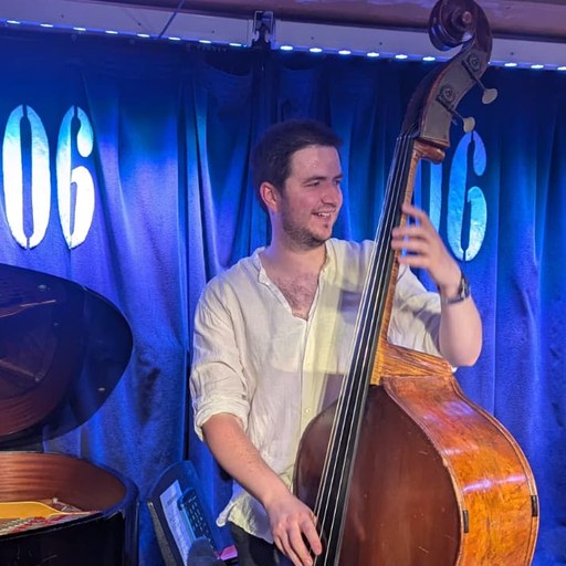 Cameron Barnett playing double bass at the 606 Club